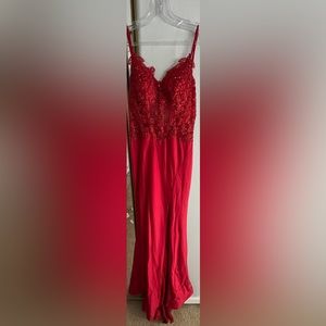 I’m selling a red cherry prom dress from dressed in time! Size is a 00.
